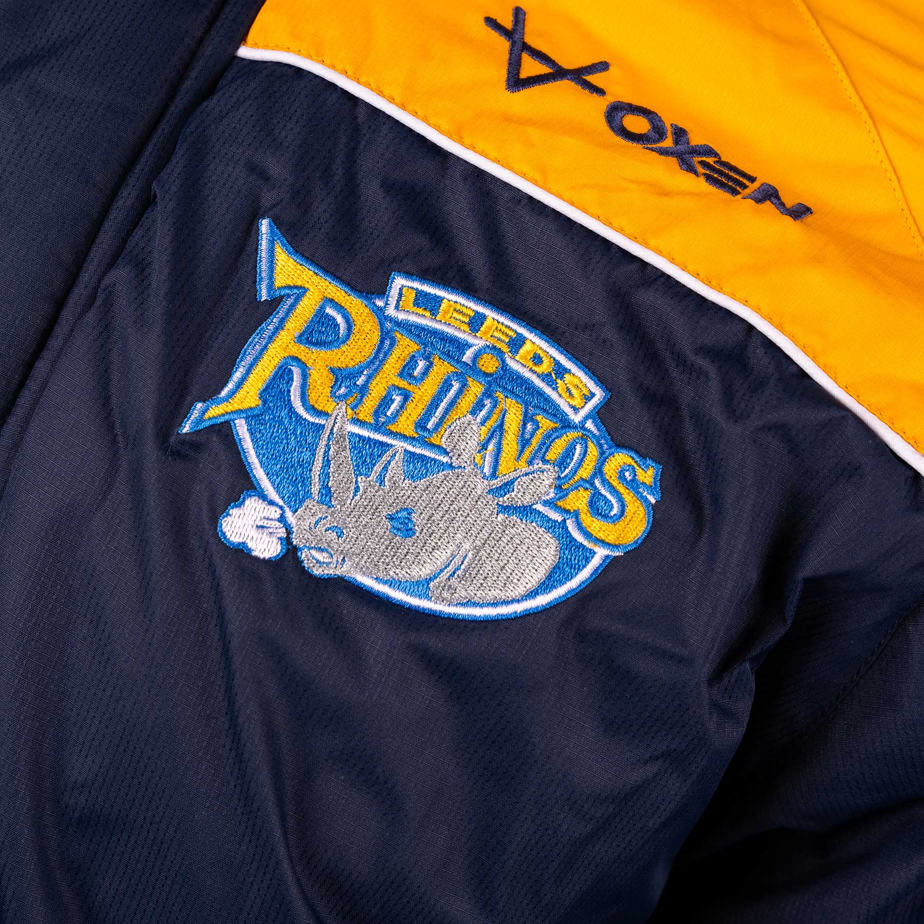Leeds Rhinos 2024 Home Managers Jacket Navy/Amb Elite Pro Sports